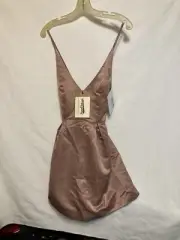 2 womens short dress sizes 1 med/1 large zip back with spaghetti straps $40 Each