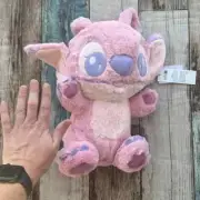 Roughly 14x9 inches Pink stitch plush