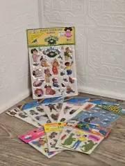 Set of (11) of 1980s Puffy Stickers Smurfs Godzilla Scooby E.T. Cabbage Patch