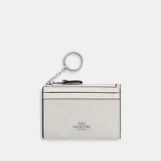 Mini Skinny Id Case In Signature Canvas