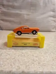 aurora tjet ho scale slot car #1414 ORANGE/MUSTARD AMX NOS