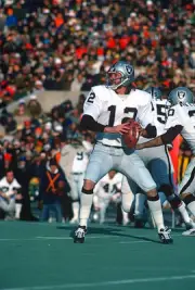 Quarterback Ken Stabler Oakland Raiders drops back to pass v the - 1976 Photo 3