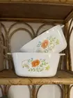 two vintage CorningWare casserole dishes in the Wildflower pattern + Lids
