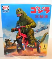 M1 GO 2006 - GLOW IN THE DARK GODZILLA / BULLMARK WIND-UP TRICYCLE 5.5" TALL NEW