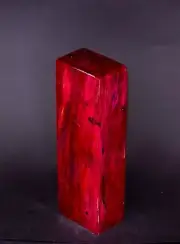 KARELIAN BIRCH WITH WORMHOLES IN CHERRY-RED STABILISATION 133*44*29mm
