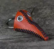 Plague doctor mask key chain, orange leather key fob.