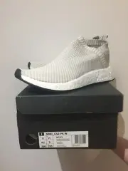 Various Ultra Boosts And NMD, And Common Projects