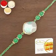Ghasitaram Gifts Rakhi for Brother Rakhis Online - RM591 - Blue Stone Bracelet Rakhi with 400 GMS of Besan Barfi
