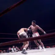 Muhammad Ali in action throws a punch vs Zora Folley during fight - Old Photo