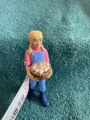 RANCHER NICOLE with basket of eggs by Safarl LTD; 820329/NEW with tag