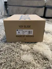 Onyx Yeezy Slide Brand New Size 9 (GOAT AUTHENTICATED!)