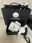 Chanel sells trendy CC mini chain bags in white champagne. cost