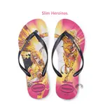 HAVAIANAS ✨零碼特賣✨ SLIM HEROINAS 神力女超人 米底黑帶 金屬LOGO人字拖-阿法.伊恩納斯