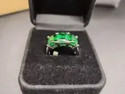 Bella Luce Rhodium over 925 Ring with 3 Green Lab Created Emeralds