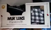 Muk Luks Men's 2 Piece Slipper and Bottle Sweater Set (Black / White) Med 10-11