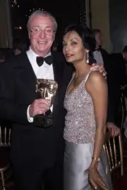 British actor Michael Caine and wife attend the BAFTA Awards after- Old Photo