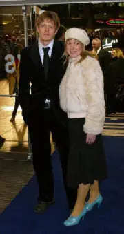 Kris Marshall and his partner Harriette Quarrie arrive at the UK - 2004 Photo 1