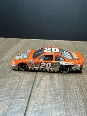 ACTION NASCAR 1/24 #20 TONY STEWART HOME DEPOT/JURASSIC PARK III DIECAST Bank