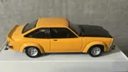 TRAX 1:43 diecast model of a 1976 Holden LX hatchback Torana TR28B.