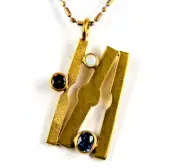 14 k SOLID GOLD Avant Garde Tanzanite ,Garnet , Australian Opal Pendant