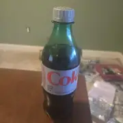 Diet Coke error 16.9 oz plastic in green bottle