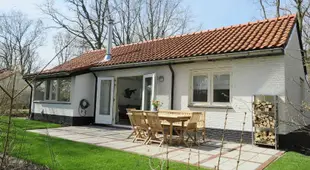 Holiday house behind the dunes of the Netherlands largest southern beach