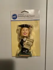 Wilton Graduate Girl Bobbling Cake Topper