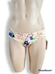 Rip Curl, seamless, reversible bikini bottoms. Apricot/ light orange