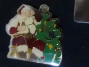 COCA-COLA HADDON SUNDBLOM SANTA SITTING BY TREE WITH A COKE LAPEL PIN