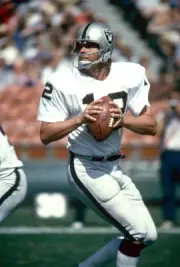 Quarterback Ken Stabler Oakland Raiders drops back to pass at a m- 1974 Photo 3