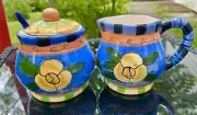 Ceramic Hand Painted by Miloon and Louis Creamer and Sugar Container & Spoon