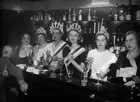 The Muse Mademoiselle Dessel bridesmaids behind bar Moulin de Mont- 1935 Photo