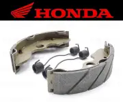 Set of (2) Honda Water Grooved FRONT Brake Shoes and Springs #45151-HB3-003