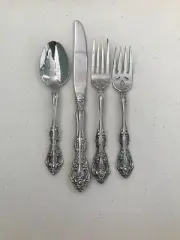 Used as Display. Oneida Michelangelo Fine Flatware Set, Spoon missing