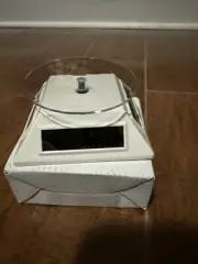 Rotating Display Stand 360° Solar/Battery Powered Turntable Base for Jewelry NIB