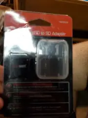 Gigaware MicroSD to SD Adapter. New crack in plastic as per photo
