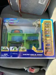 THE ORIGINAL MICRO MACHINES MICRO GAS N DASH EXPANDING PLAYSET IN HAND