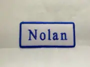 NOLAN NEW EMBROIDERED SEW / IRON ON NAME PATCH BLUE ON WHITE