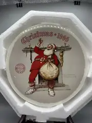 Norman Rockwell Christmas 1995 Plate “Filling The Stocking” Knowles