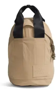 THE NORTH FACE Women's Never Stop Mini Backpack, Kelp Tan/TNF Black