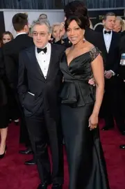 Actor Robert De Niro Grace Hightower arrive at the Oscars held at - 2013 Photo 2