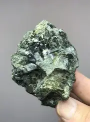 Natural dark green color epidote cluster from an old find. Terminated crystal.