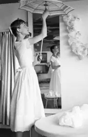 Audrey Hepburn opening an umbrella at home Buergenstock 1960 Old Photo