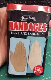 New Handages Bandages 10 large tiny hand bandages in tin by Archie McPhee 3x1.5"