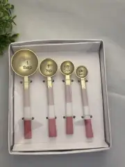 NIB Set Of 4 Pinks, White and Gold Measuring Spoons