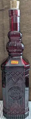 Red Glass Decorating Bottle 11.75”H Raised Design & Cork Vintage