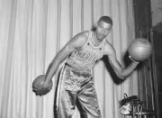 Wilt Chamberlain formerly with the University of Kansas at Toots S .. Old Photo