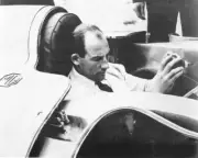 Stirling Moss ran 67 Formula One World Championship races between - Old Photo