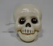 VTG 1x GHOST SKULL 1.5" WIND UP CLIP PIN TOY JERKING FORWARD w/ CHATTERING MOUTH