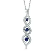 Lab-Created Blue Sapphire and Diamond Accent Three Stone Pendant in Sterling Silver